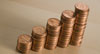 pennies stacked in ascending order